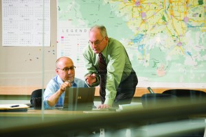 City workers at desk